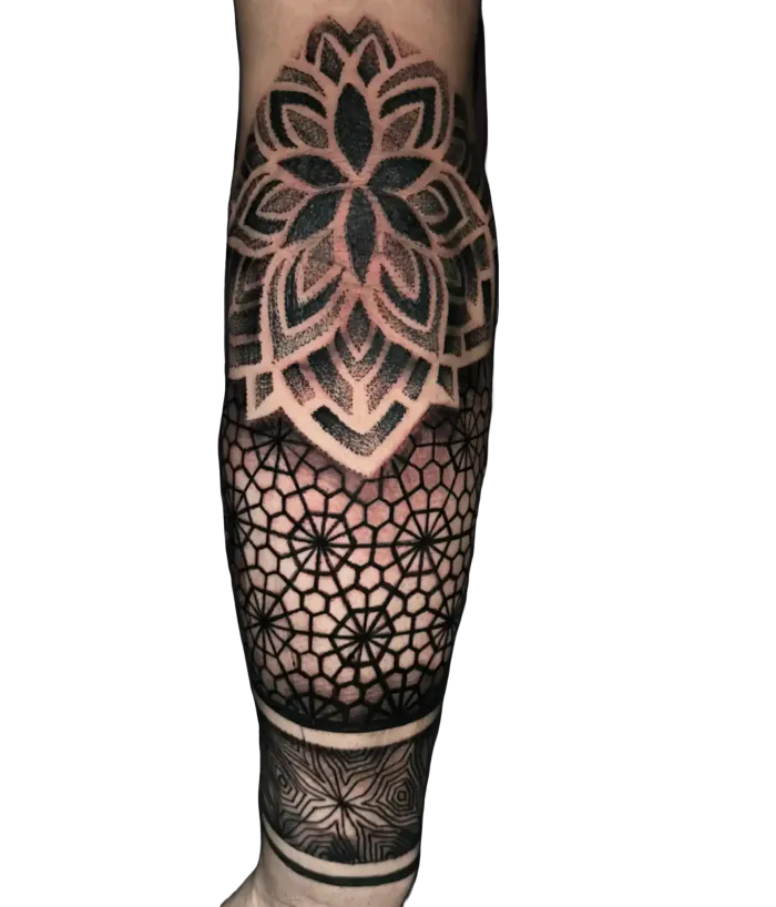 Forearm geometric tattoo with a mandala, honeycomb pattern and dotwork shading by Duk Tattoo, Boca Raton